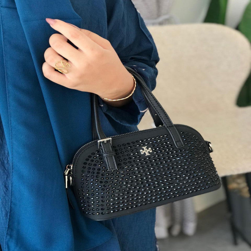 شنطة نسائية من ماركة توري بورش